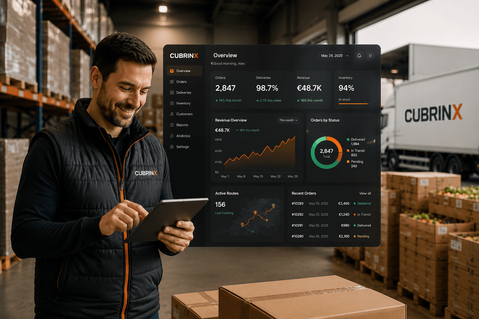 Cubrinx operations manager with tablet in a food distribution warehouse beside a branded delivery truck